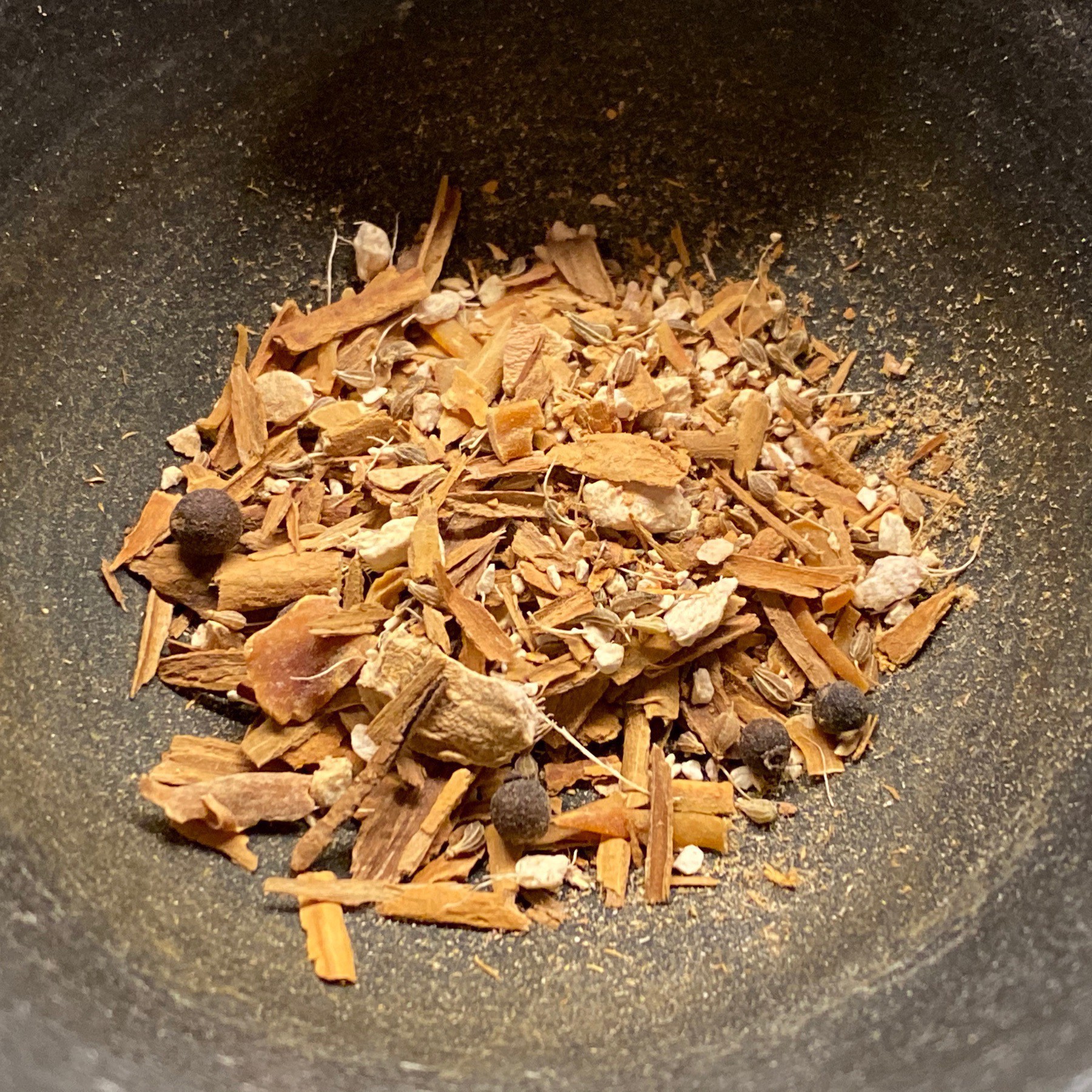 Spices in mortar and pestle.