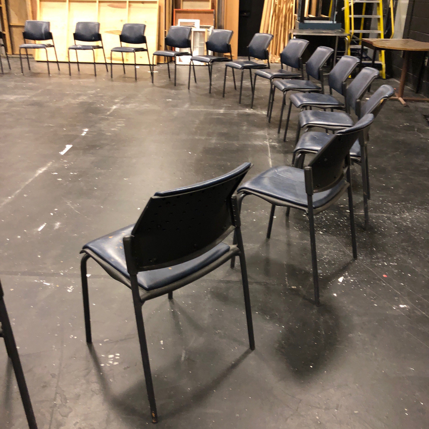 Chairs is semicircle in film studio.