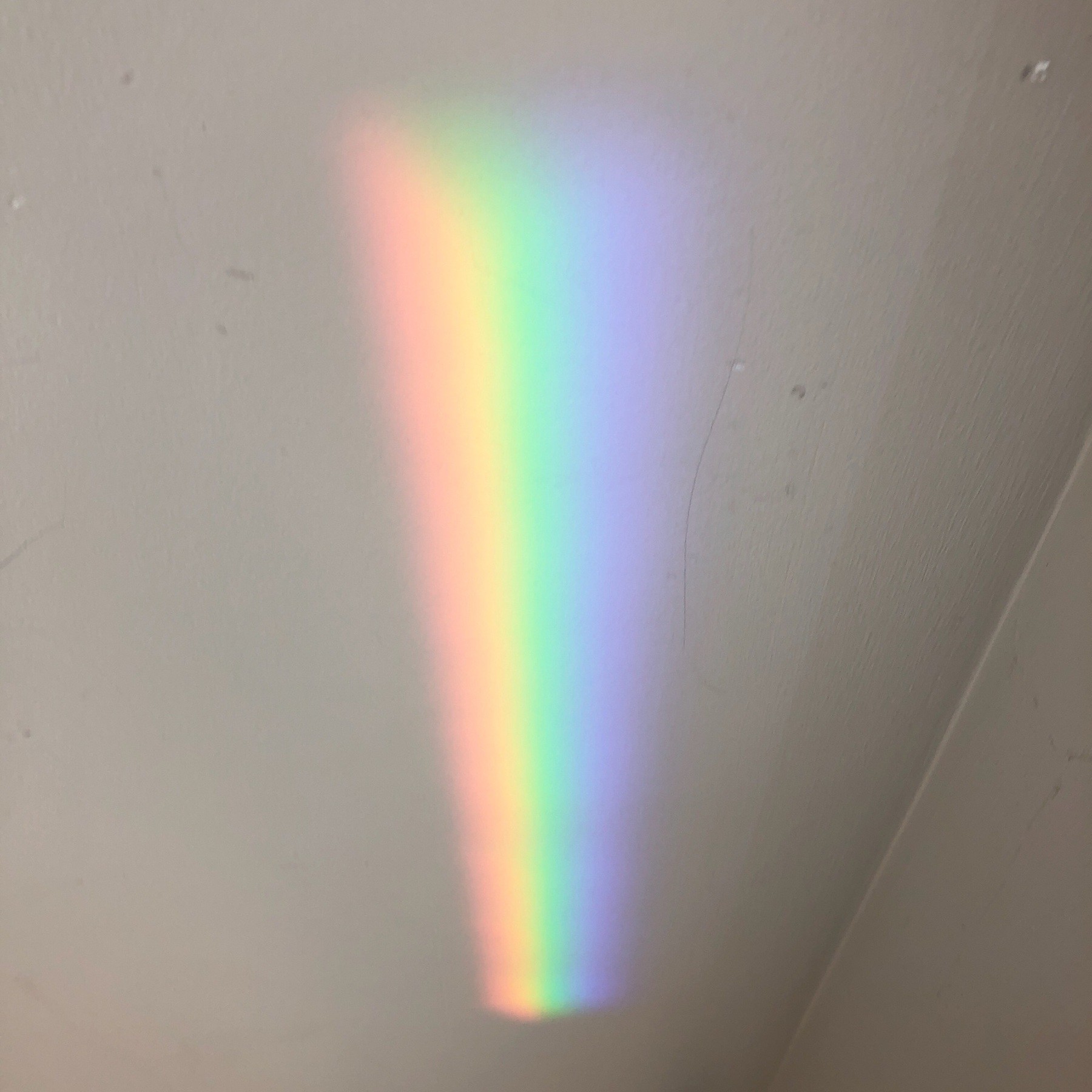 Refracted light on wall.