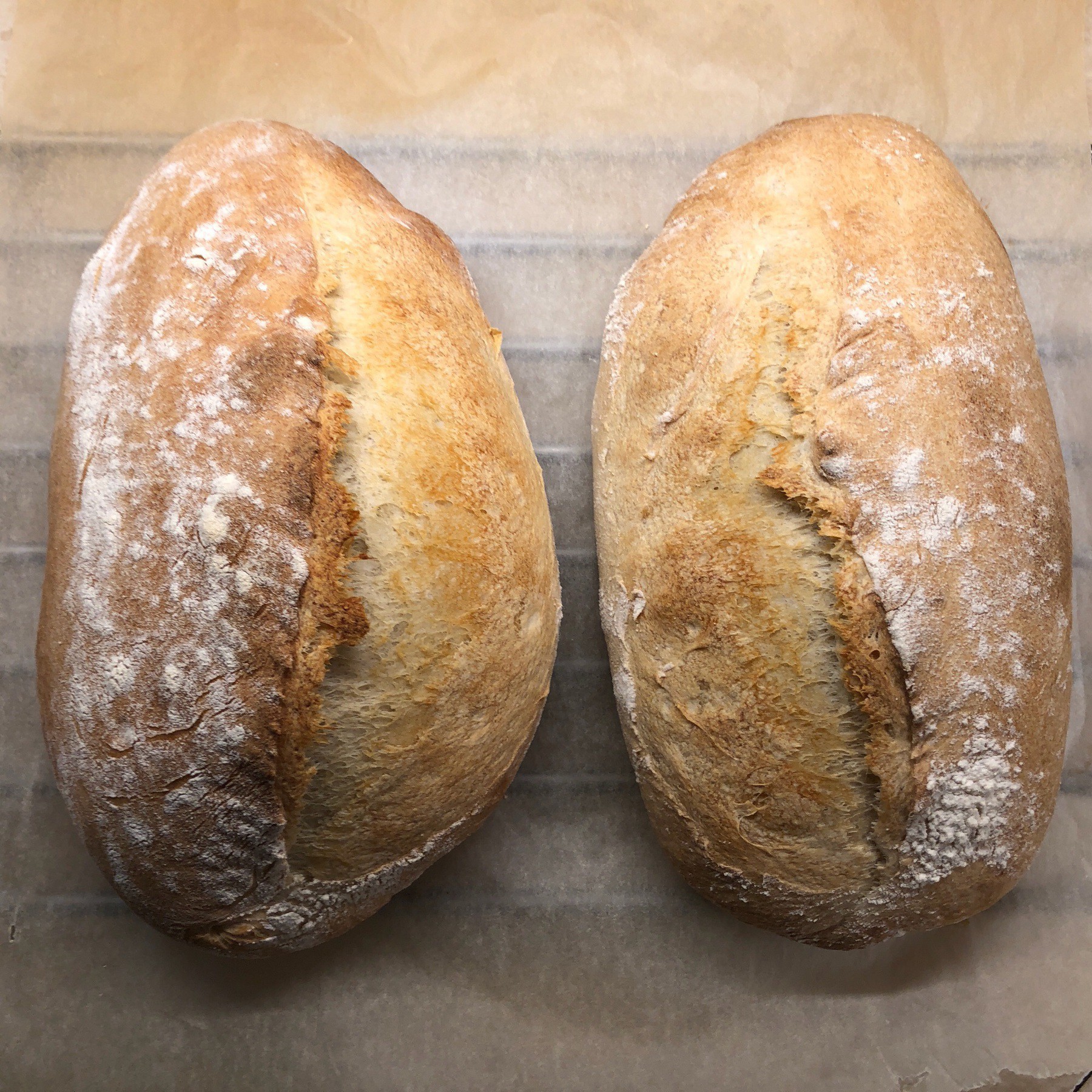 Sourdough bread on cooling rack.